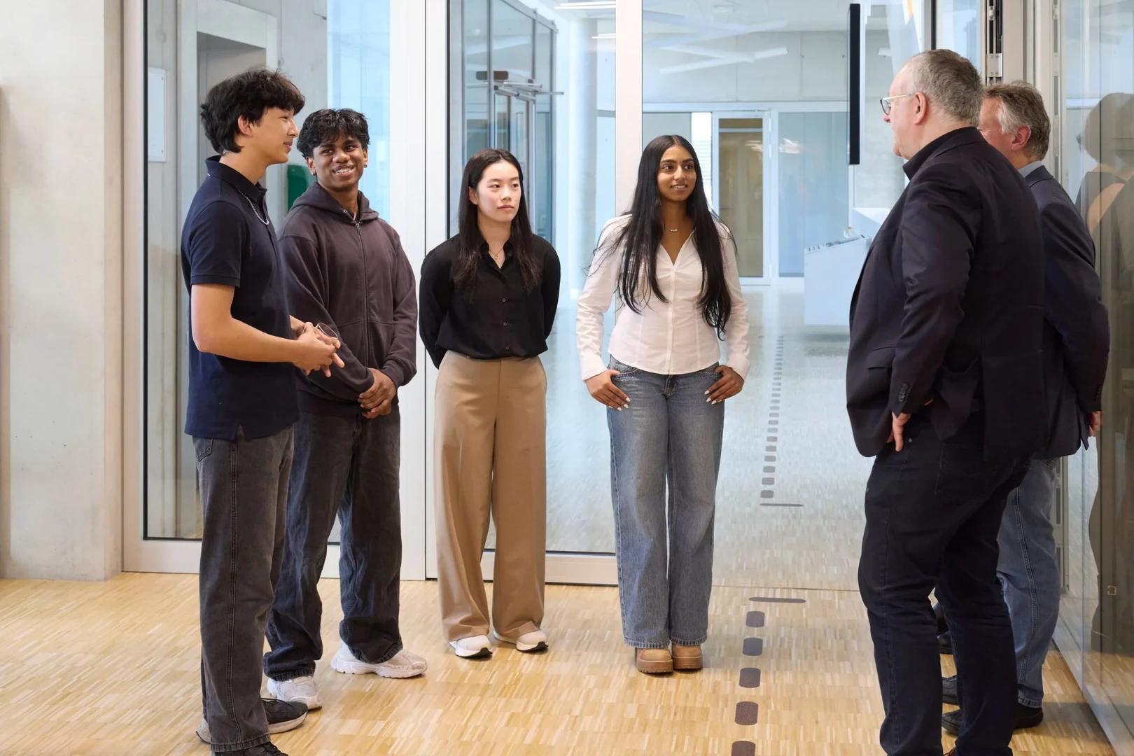 BL4S Participants: Weiyee, Ryan, Sanjana and Leo talking with Sponsors and Professors
