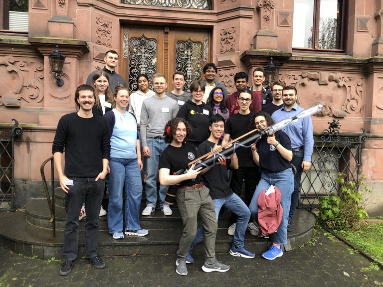 Group picture together with the Physikshow Bonn and a self-made "plasma cannon".